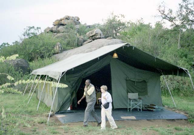 Chris Kibuku and Shirley in front of the dining tent