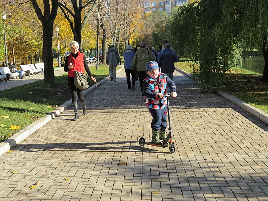 kid on scooter