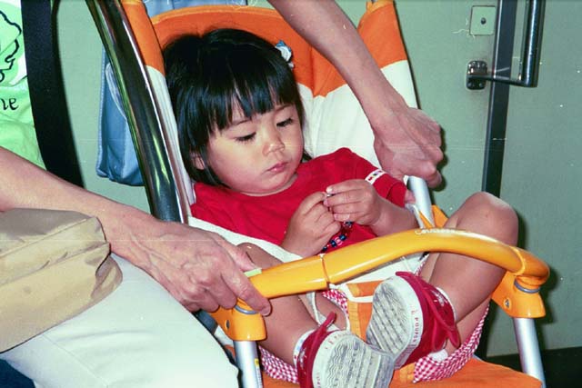 Child on a commuter train in Kyoto