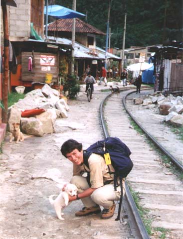 Pat petting a puppy